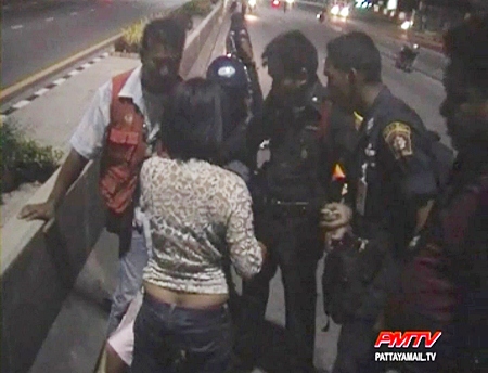 The man tries to recover from his attack surrounded by unsympathetic officers and taxi drivers.